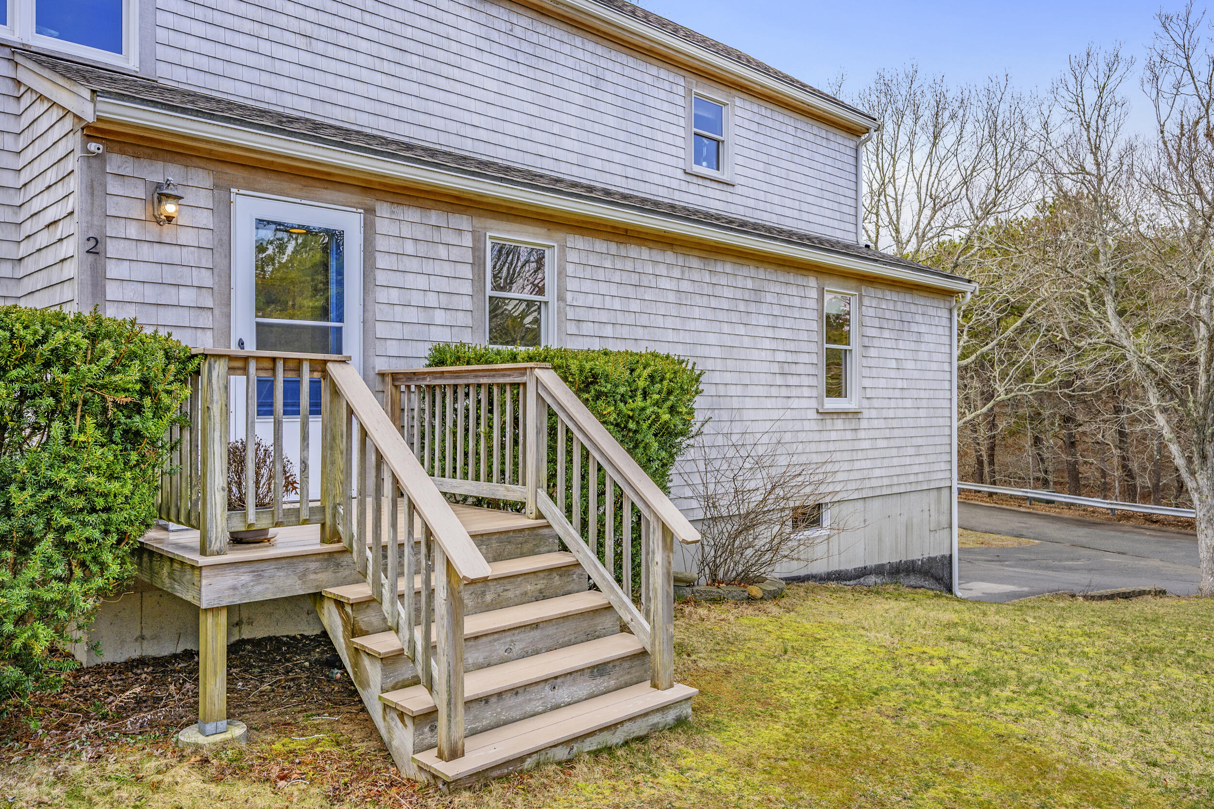 2 Short Lots Lane Truro, MA 02666 - Photo 40 of 66 a view of a house with backyard and wooden fence
