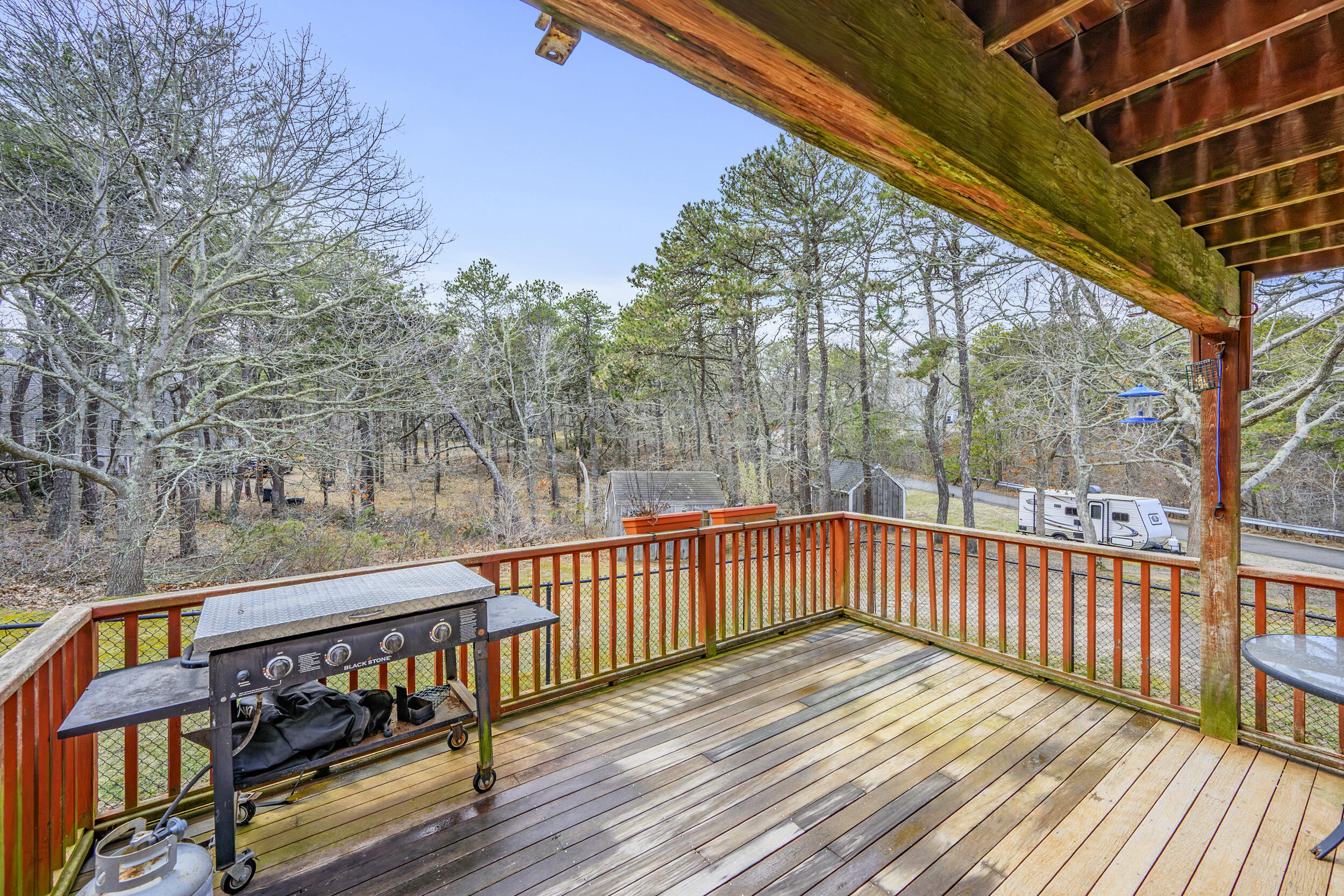 2 Short Lots Lane Truro, MA 02666 - Photo 51 of 66 a view of deck with wooden floor and fence with a bench