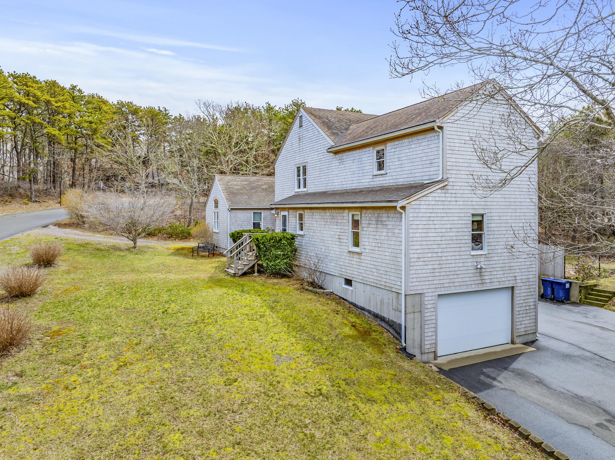 2 Short Lots Lane Truro, MA 02666 - Photo 55 of 66 a view of a backyard with plants and large tree