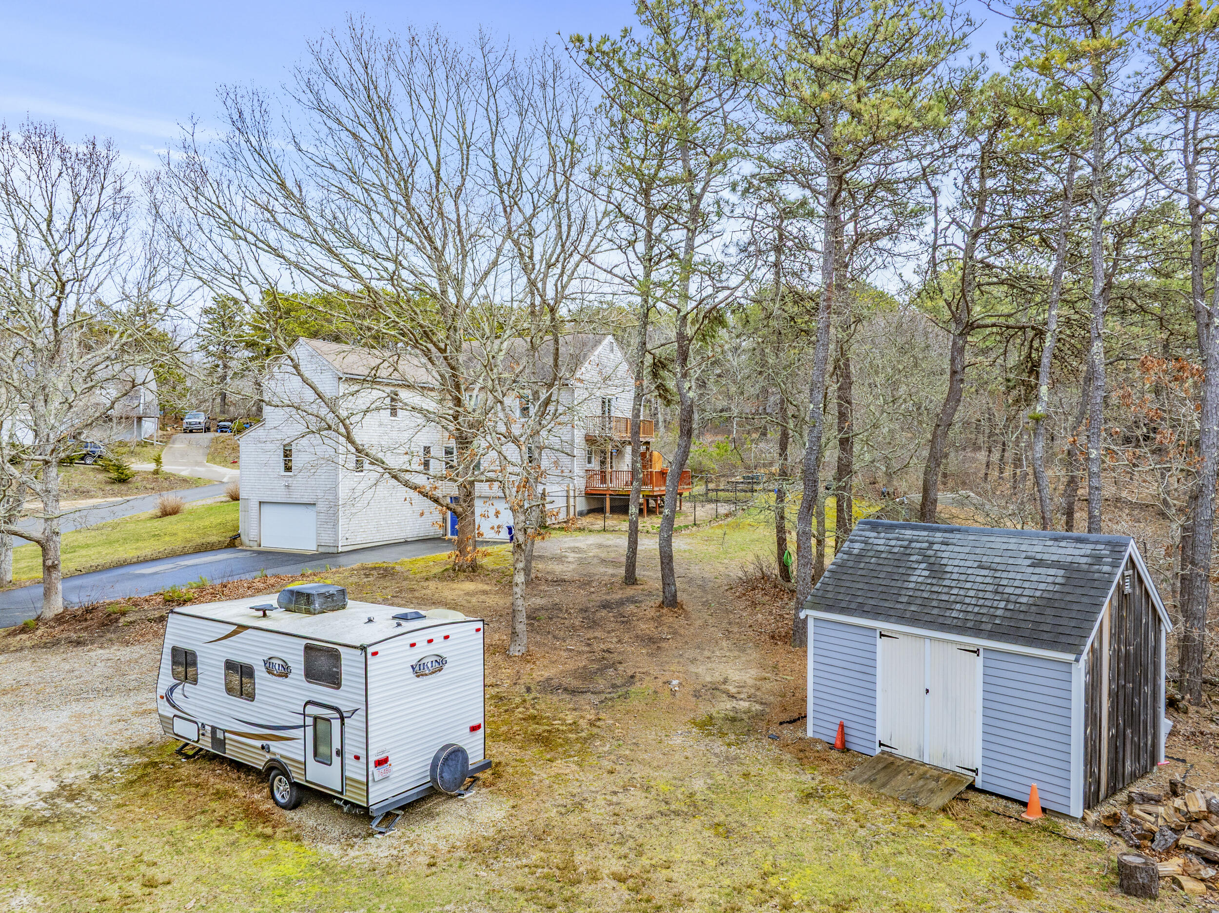 2 Short Lots Lane Truro, MA 02666 - Photo 56 of 66 a view of a house with backyard and trees