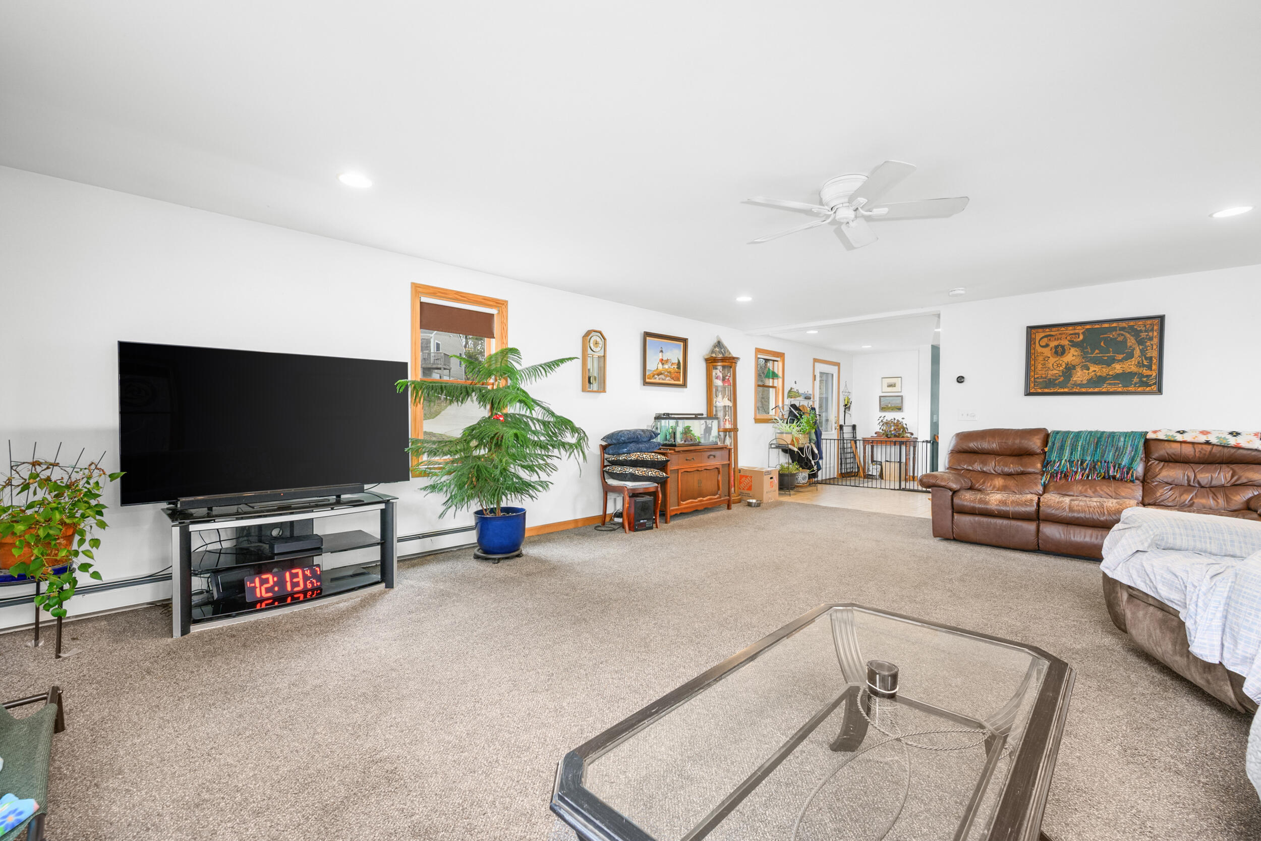2 Short Lots Lane Truro, MA 02666 - Photo 9 of 66 a living room with furniture and a flat screen tv