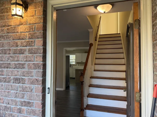 a view of entryway with a bathroom
