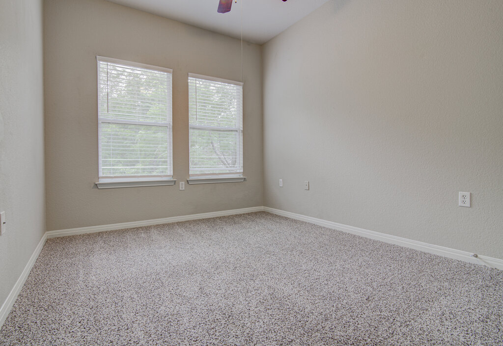 1702 Singleton Avenue, Unit A Austin, TX 78702 - Photo 16 of 27 an empty room with a window