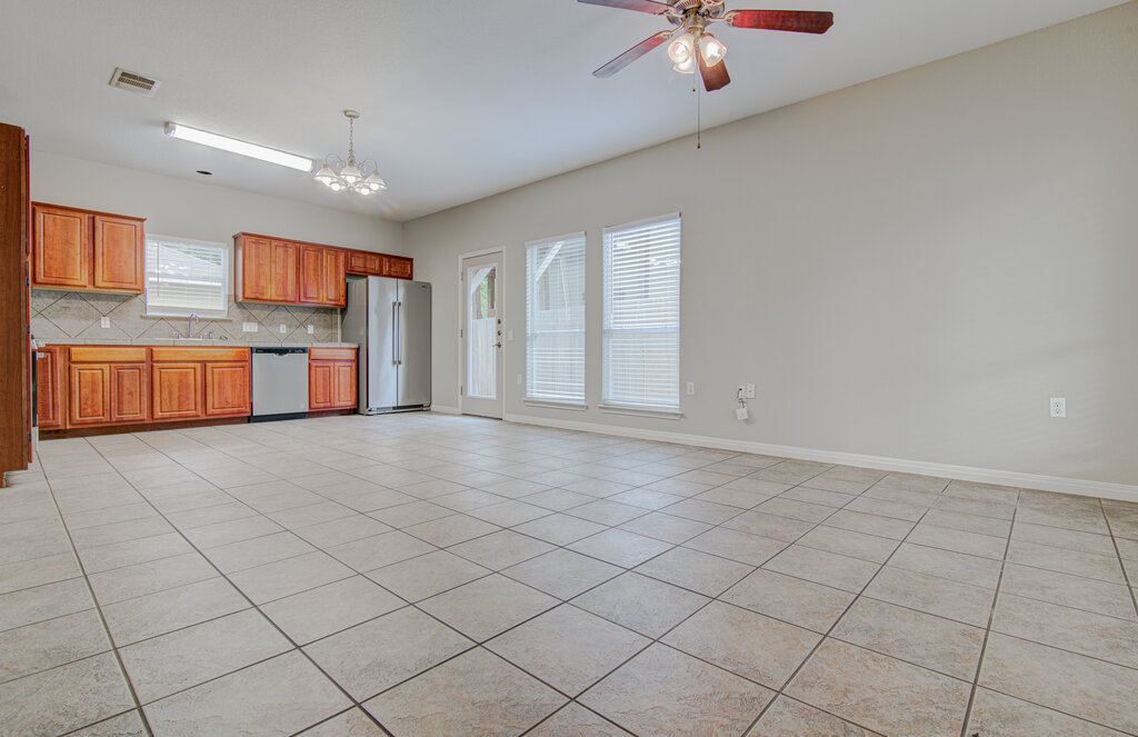 1702 Singleton Avenue, Unit A Austin, TX 78702 - Photo 6 of 27 a view of a kitchen with a sink and cabinets