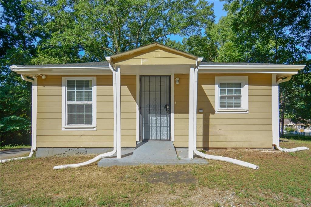 176 Brownlee Road Southwest Atlanta, GA 30331 - Photo 1 of 1 front view of a house with a yard