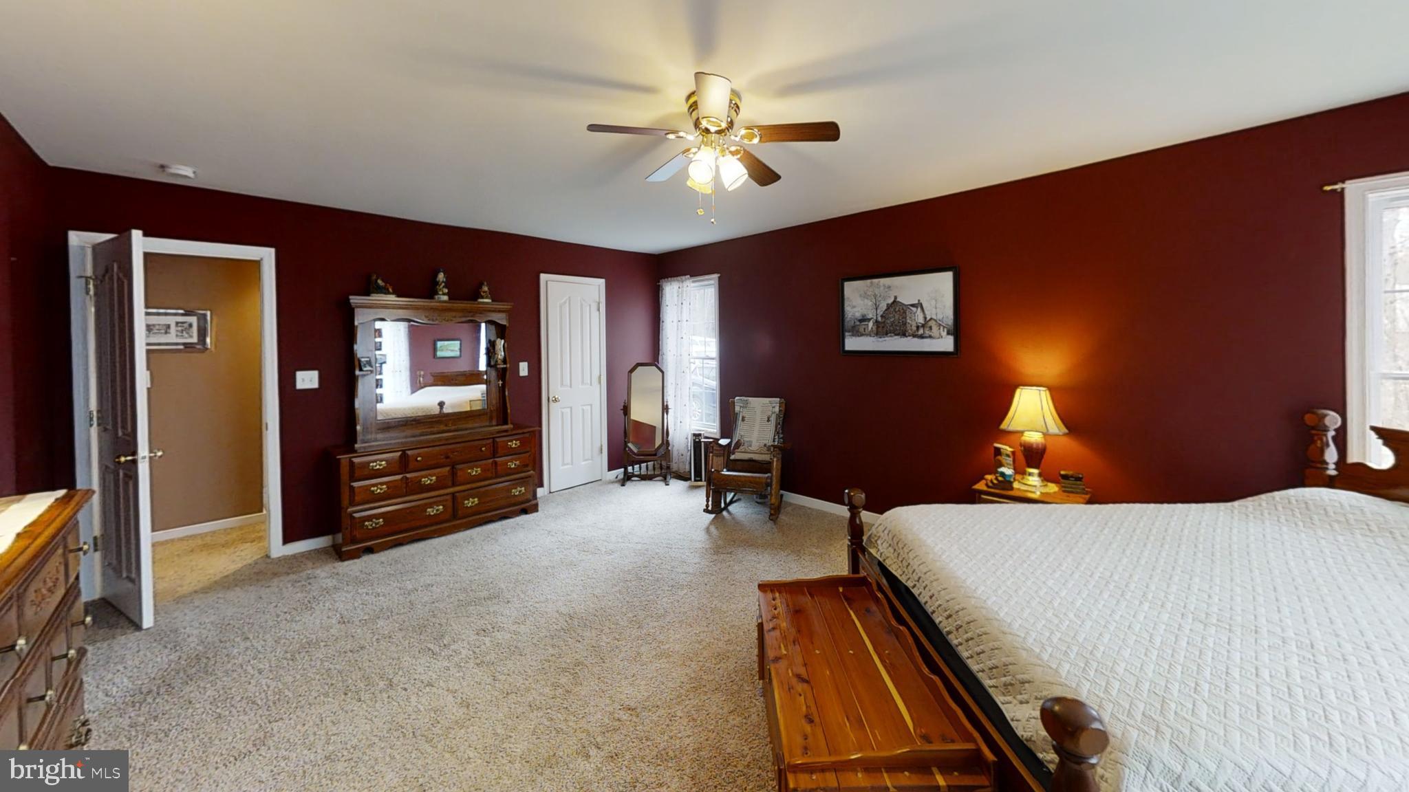 839 Daniel Road Louisa, VA 23093 - Photo 10 of 31 a bed room with a bed and a television