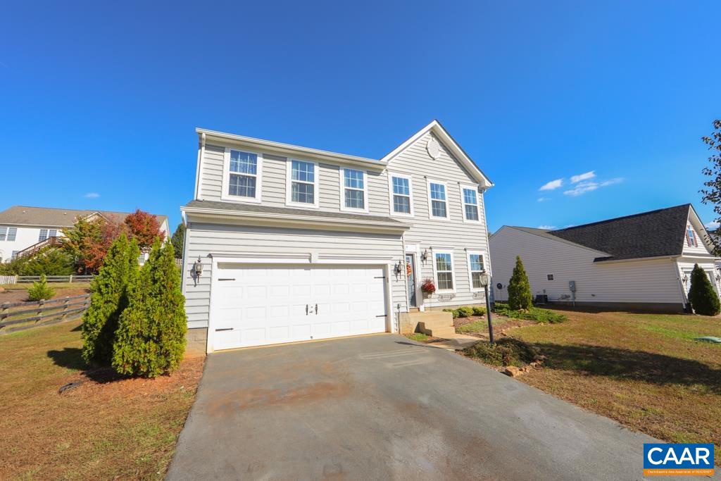 309 Ridgemont Road Ruckersville, VA 22968 - Photo 29 of 29 a view of a house with a backyard and a tree
