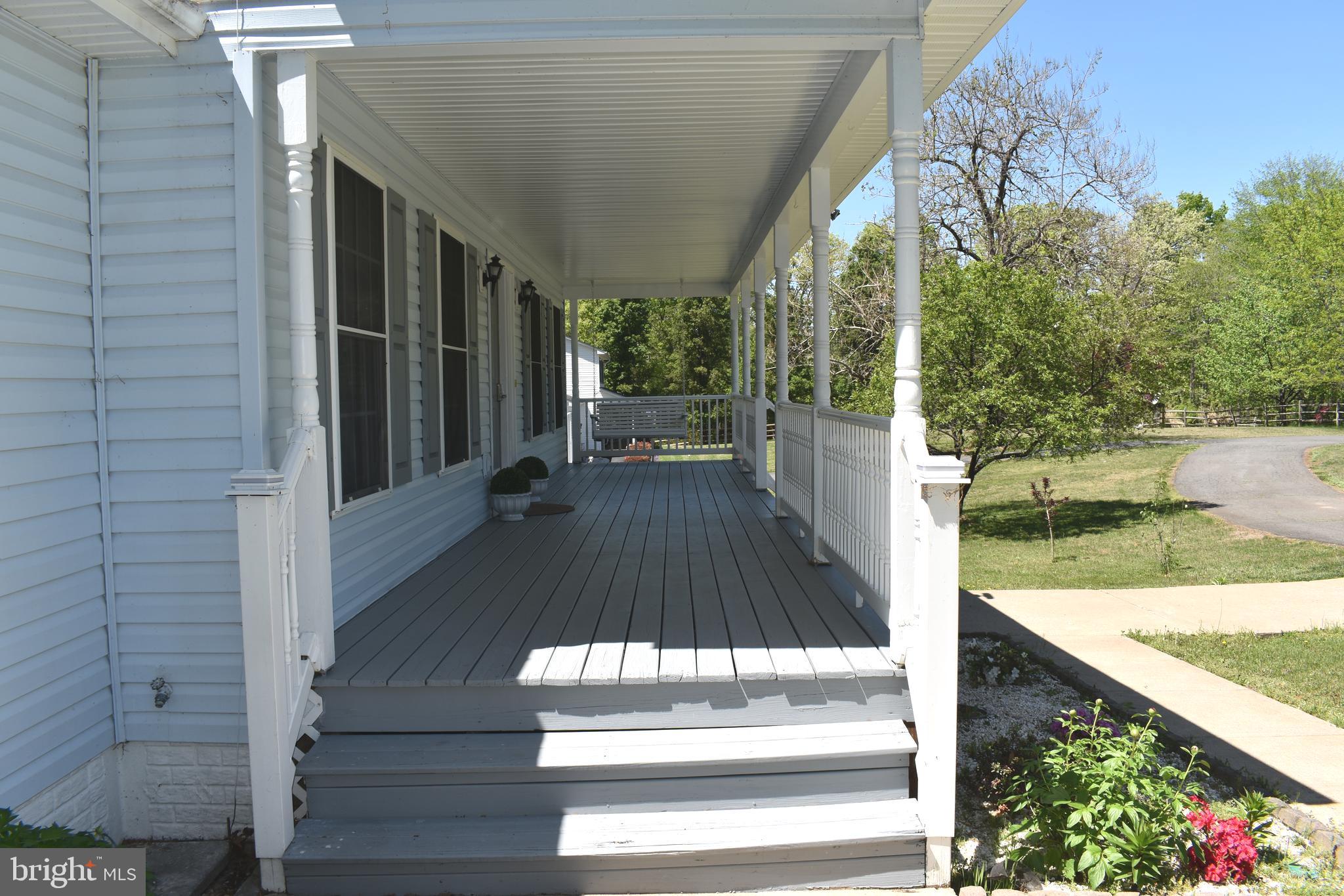 10958 Mountain Run Lake Road Culpeper, VA 22701 - Photo 2 of 31 a view of backyard with patio