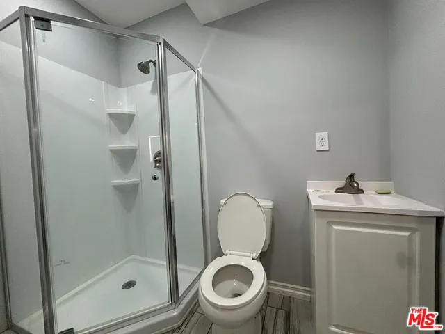 a bathroom with a toilet and a sink