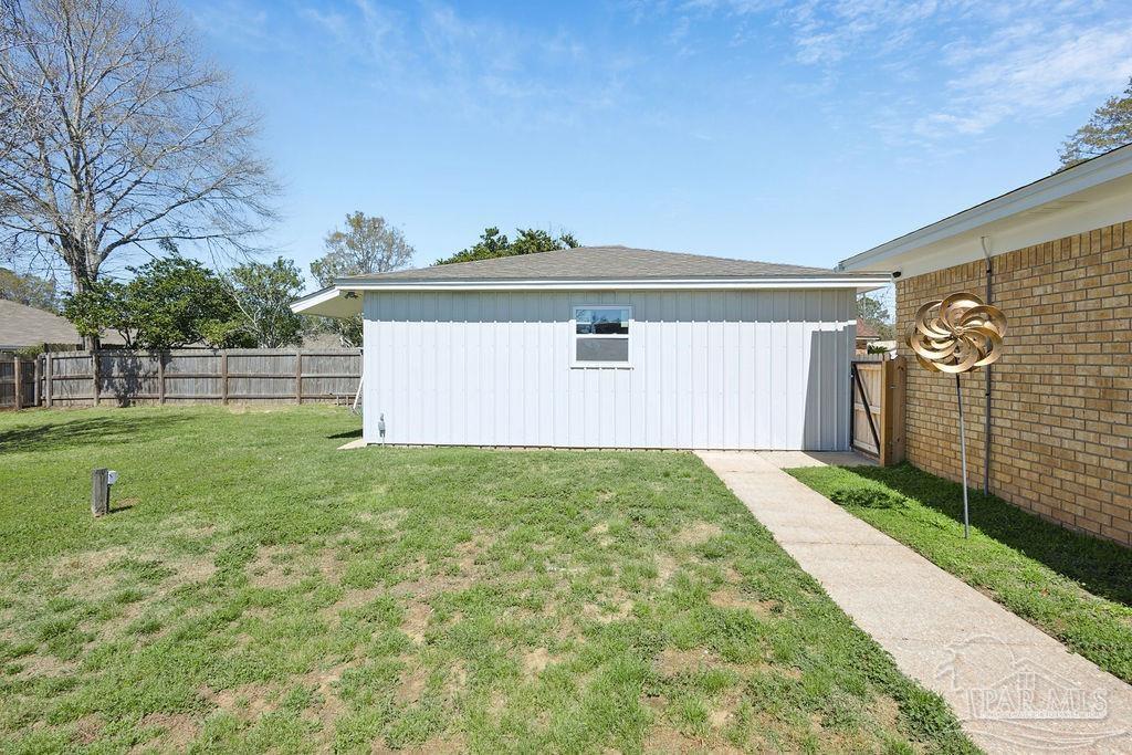 2329 Ryale Road Cantonment, FL 32533 - Photo 26 of 31 a front view of house with yard