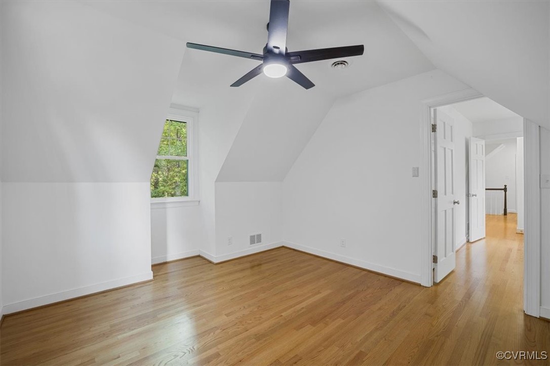 8221 Hopkins Road Richmond, VA 23237 - Photo 32 of 37 a view of empty room with wooden floor and fan
