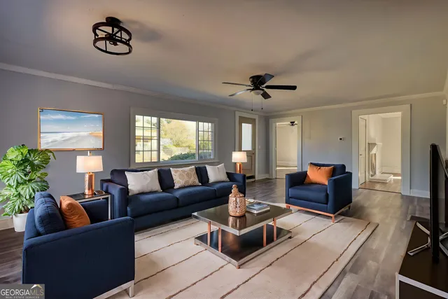 a living room with furniture and a window