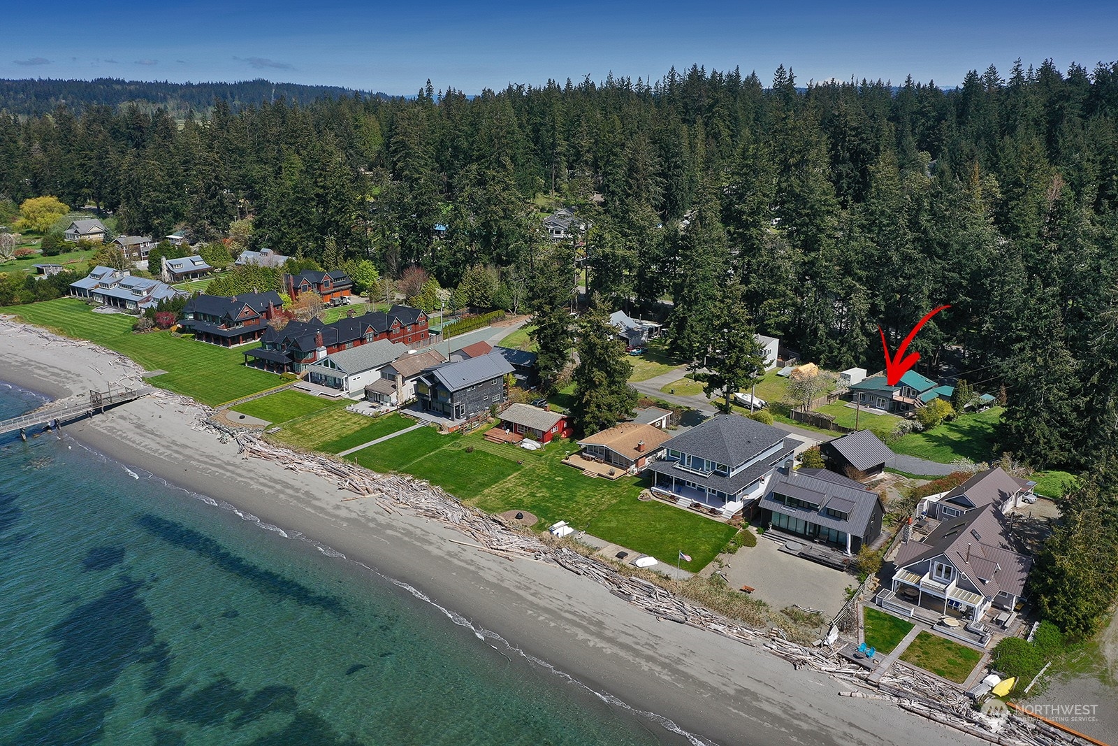 5880 Mutiny Bay Road Freeland, WA 98249 - Photo 2 of 40 an aerial view of a house with a garden