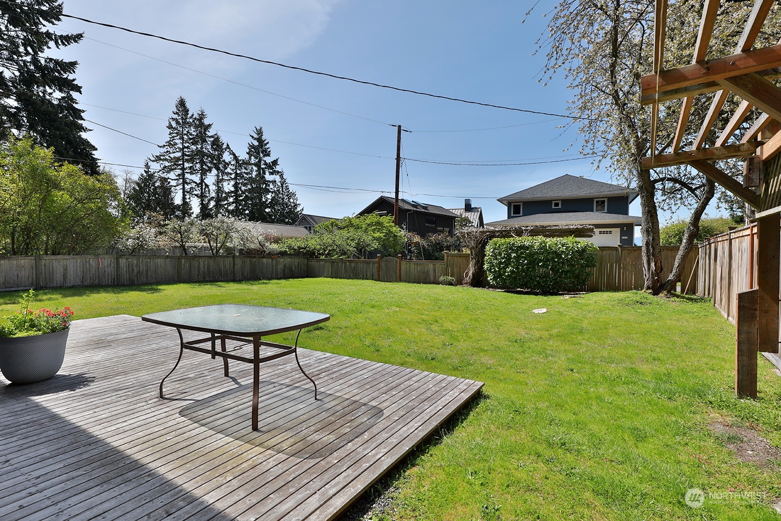 5880 Mutiny Bay Road Freeland, WA 98249 - Photo 21 of 40 a view of a deck with furniture