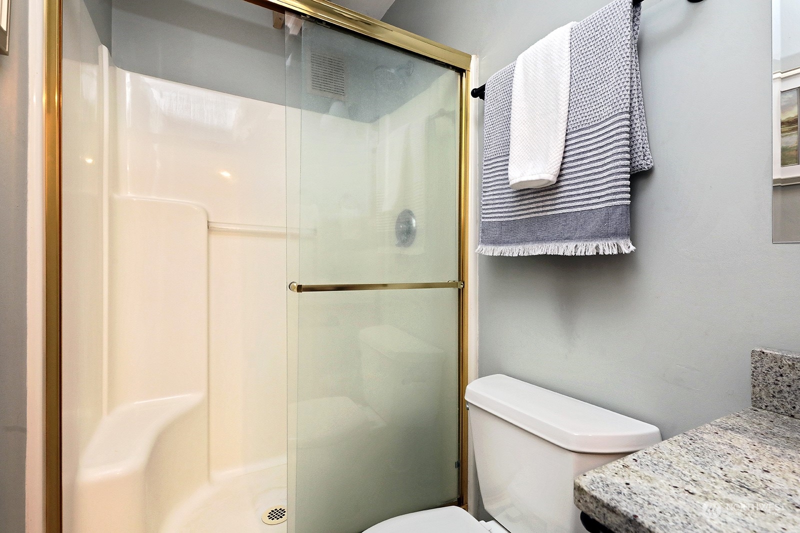 5880 Mutiny Bay Road Freeland, WA 98249 - Photo 28 of 40 a bathroom with a sink and toilet