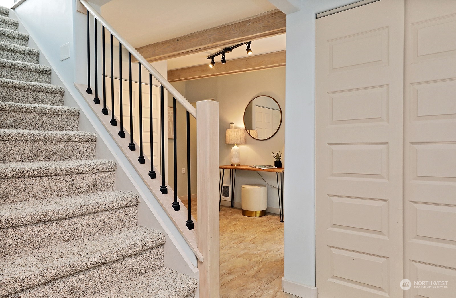 5880 Mutiny Bay Road Freeland, WA 98249 - Photo 29 of 40 a view of a hallway with wooden floor and entryway