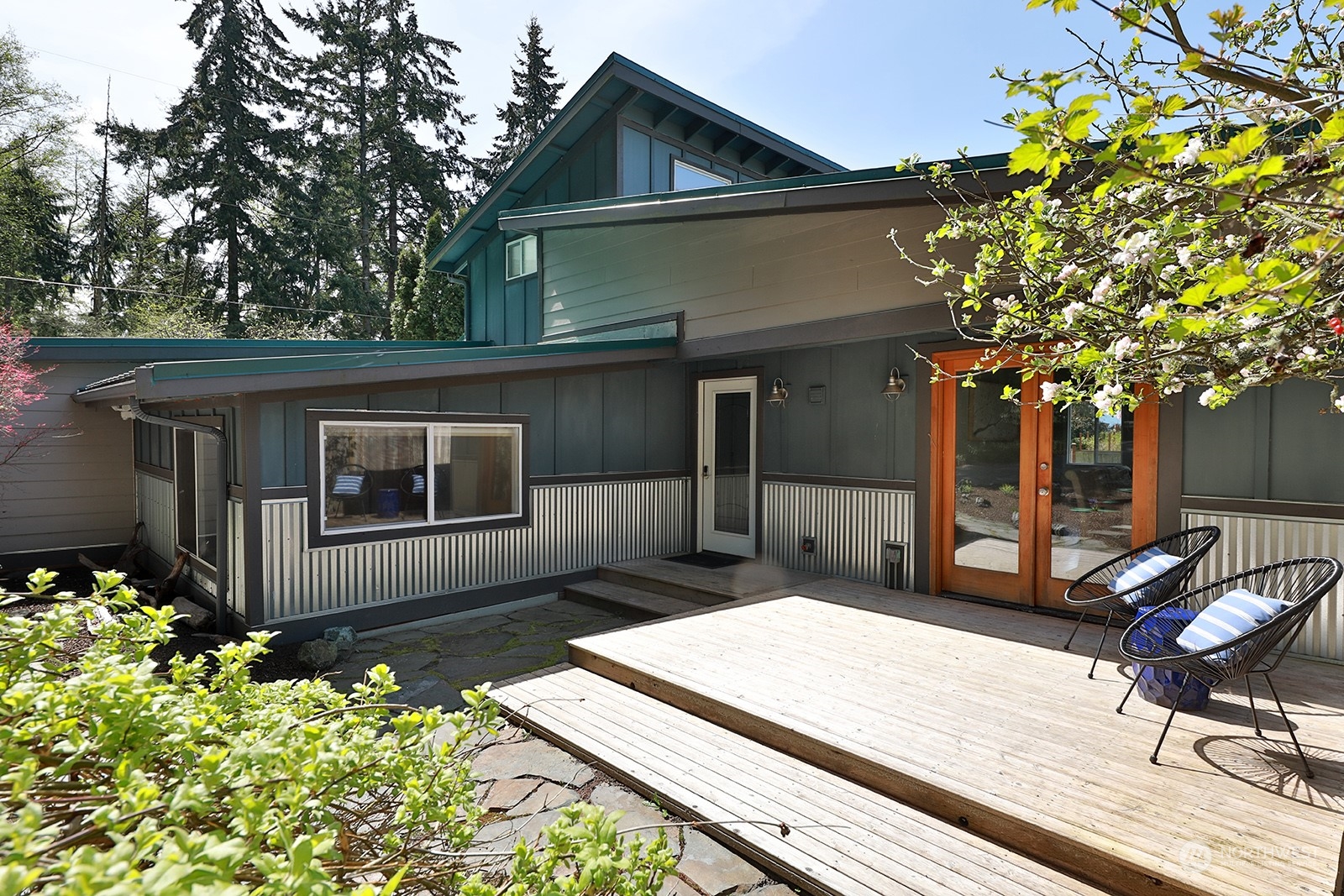 5880 Mutiny Bay Road Freeland, WA 98249 - Photo 3 of 40 a front view of a house with garden