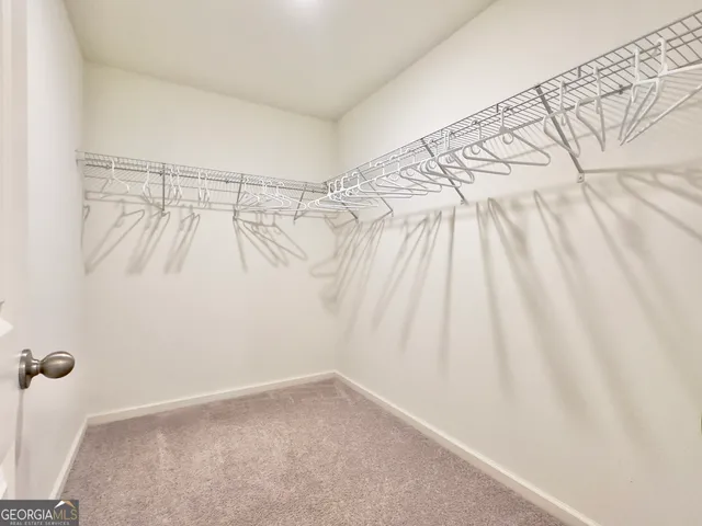 a view of a room with racks on the wall