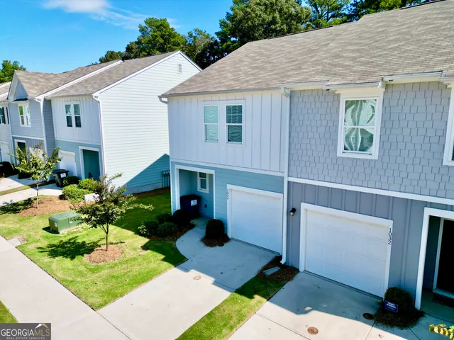 a view of backyard with potted plants