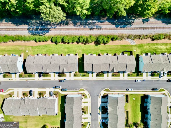 a view of swimming pool with outdoor seating and yard