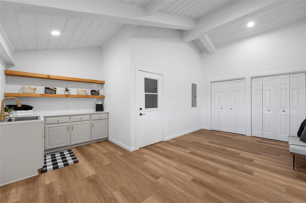 925 Church Road McGregor, TX 76657 - Photo 17 of 40 a room with a bed and a view of kitchen