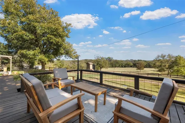 a view of a terrace with seating area