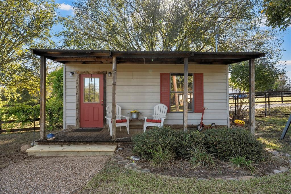 925 Church Road McGregor, TX 76657 - Photo 34 of 40 a front view of a house with garden