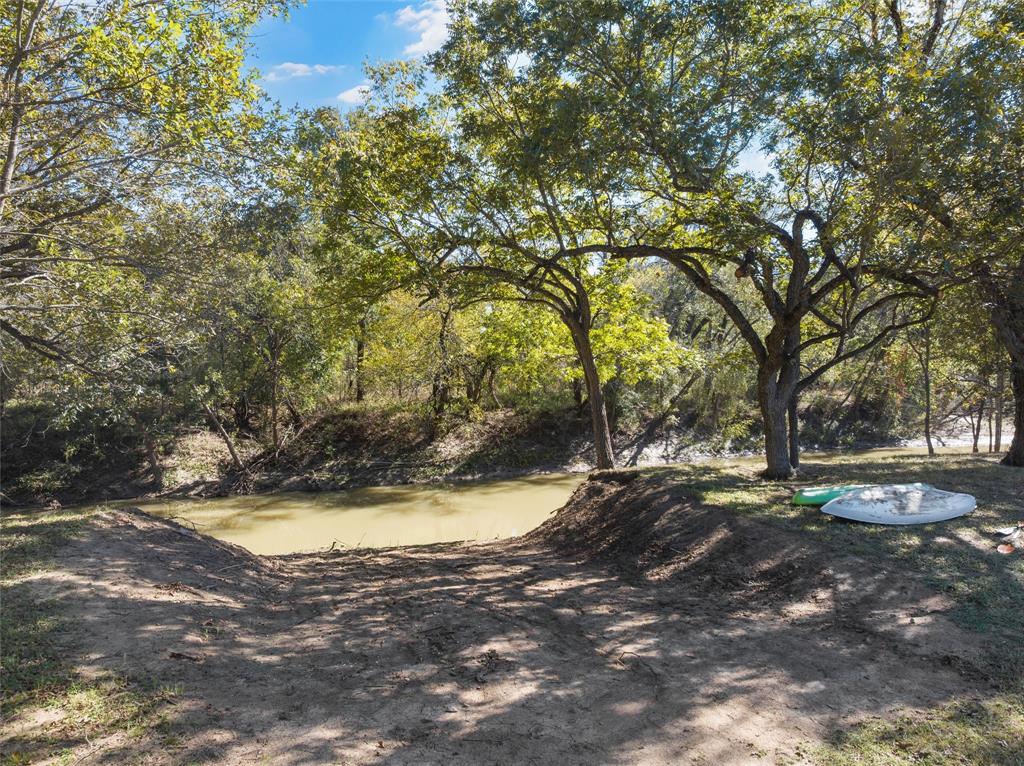 925 Church Road McGregor, TX 76657 - Photo 38 of 40 a view of a yard with a tree