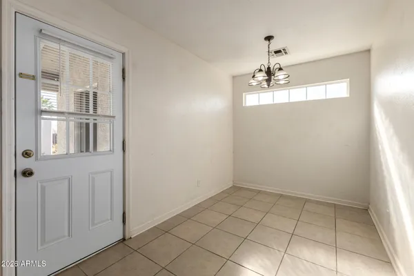 a view of a livingroom with windows