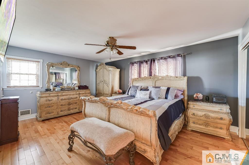 5 Starkin Road East Brunswick, NJ 08850 - Photo 14 of 34 a living room with furniture and a wooden floor