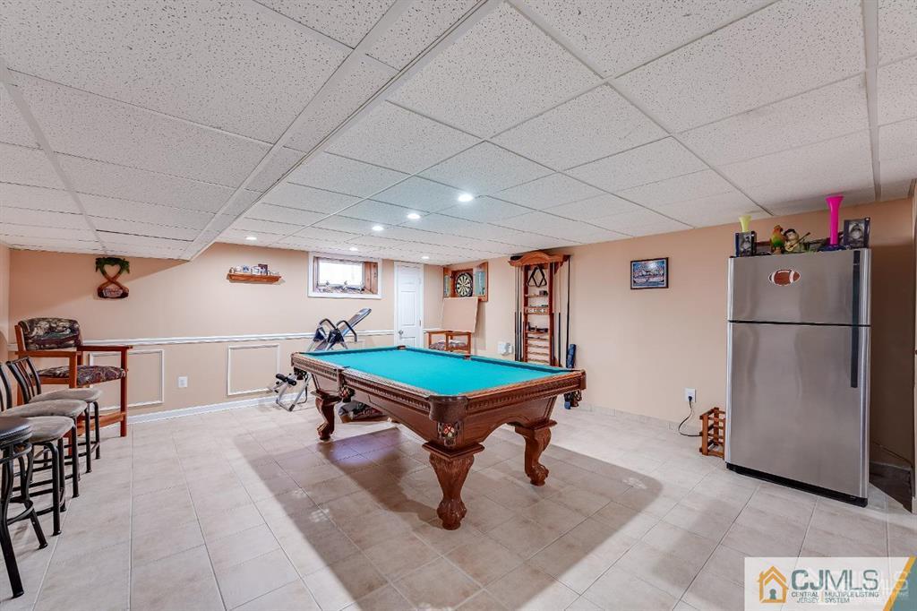 5 Starkin Road East Brunswick, NJ 08850 - Photo 21 of 34 a room with furniture and pool table
