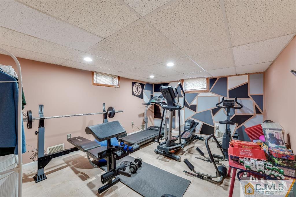 5 Starkin Road East Brunswick, NJ 08850 - Photo 22 of 34 a view of a room with gym equipment