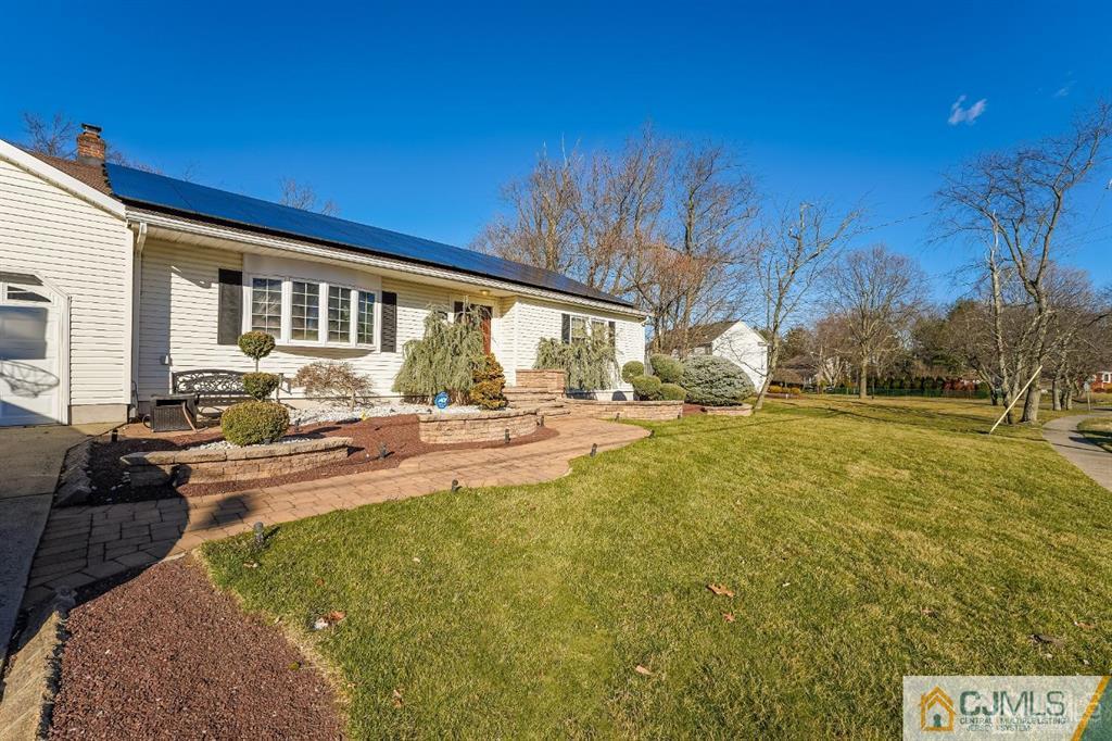 5 Starkin Road East Brunswick, NJ 08850 - Photo 26 of 34 a view of a house with backyard and sitting area