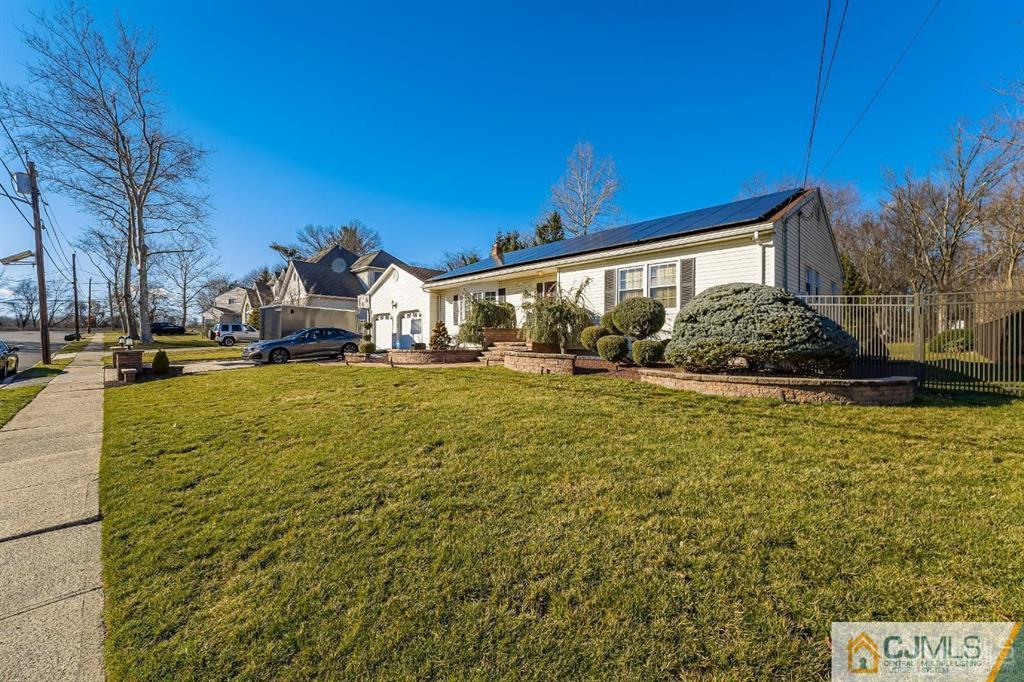 5 Starkin Road East Brunswick, NJ 08850 - Photo 29 of 34 a front view of a house with a yard