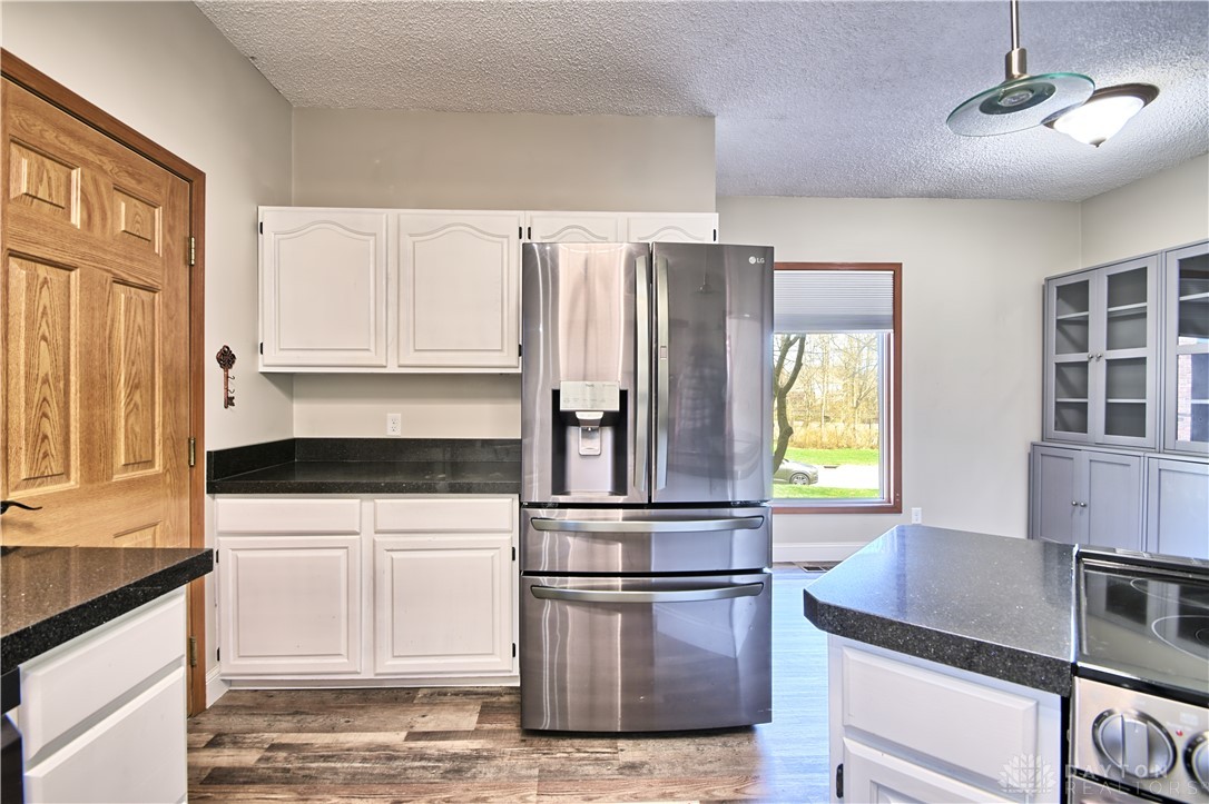 8711 Nicole Lane Springboro, OH 45066 - Photo 15 of 87 This functional kitchen features contemporary appliances and ample cabinet space for effortless living.