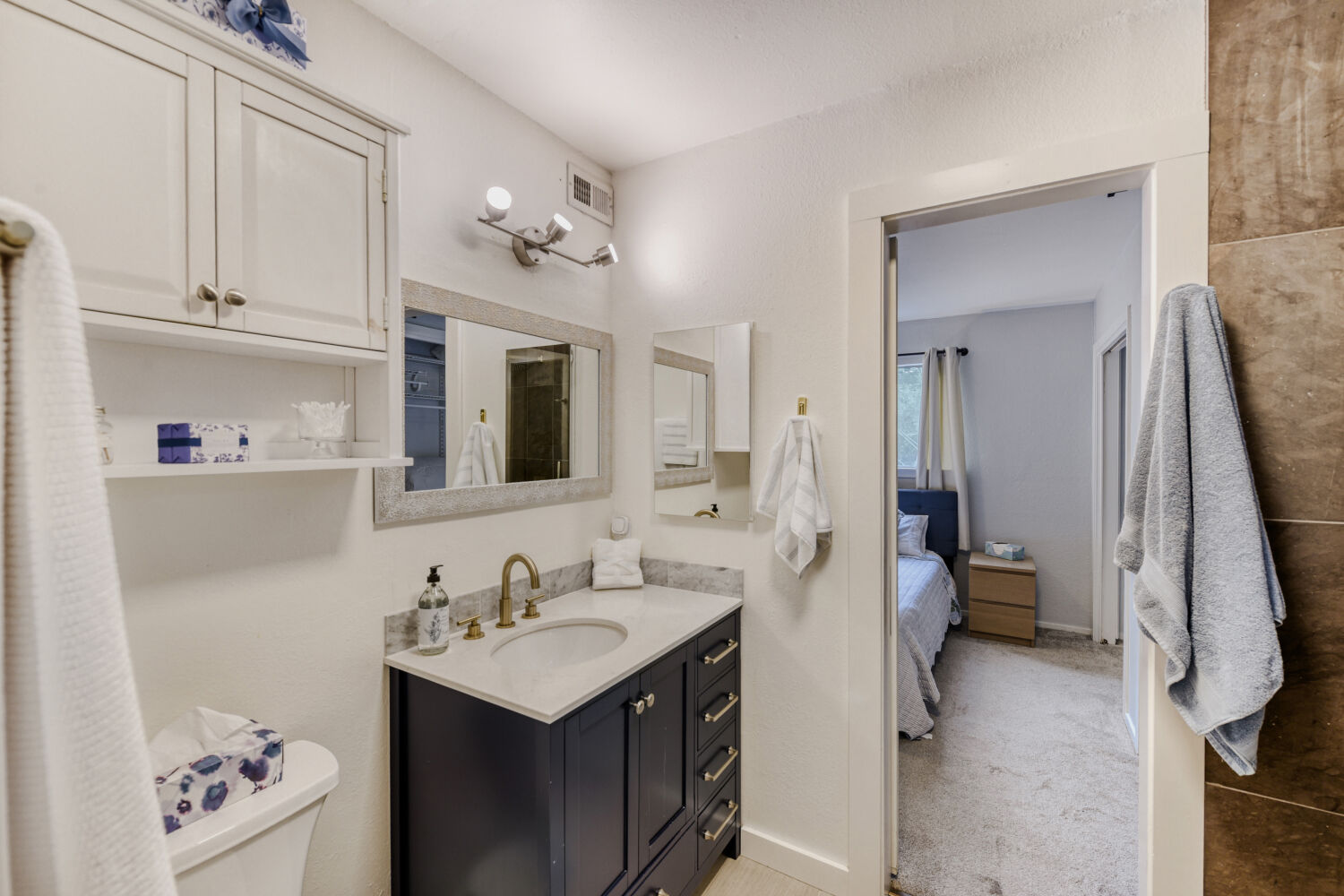 1912 Lightsey Road, Unit 6 Austin, TX 78704 - Photo 20 of 27 a bathroom with a sink vanity toilet and shower