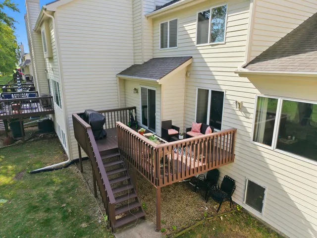 a view of a deck with furniture