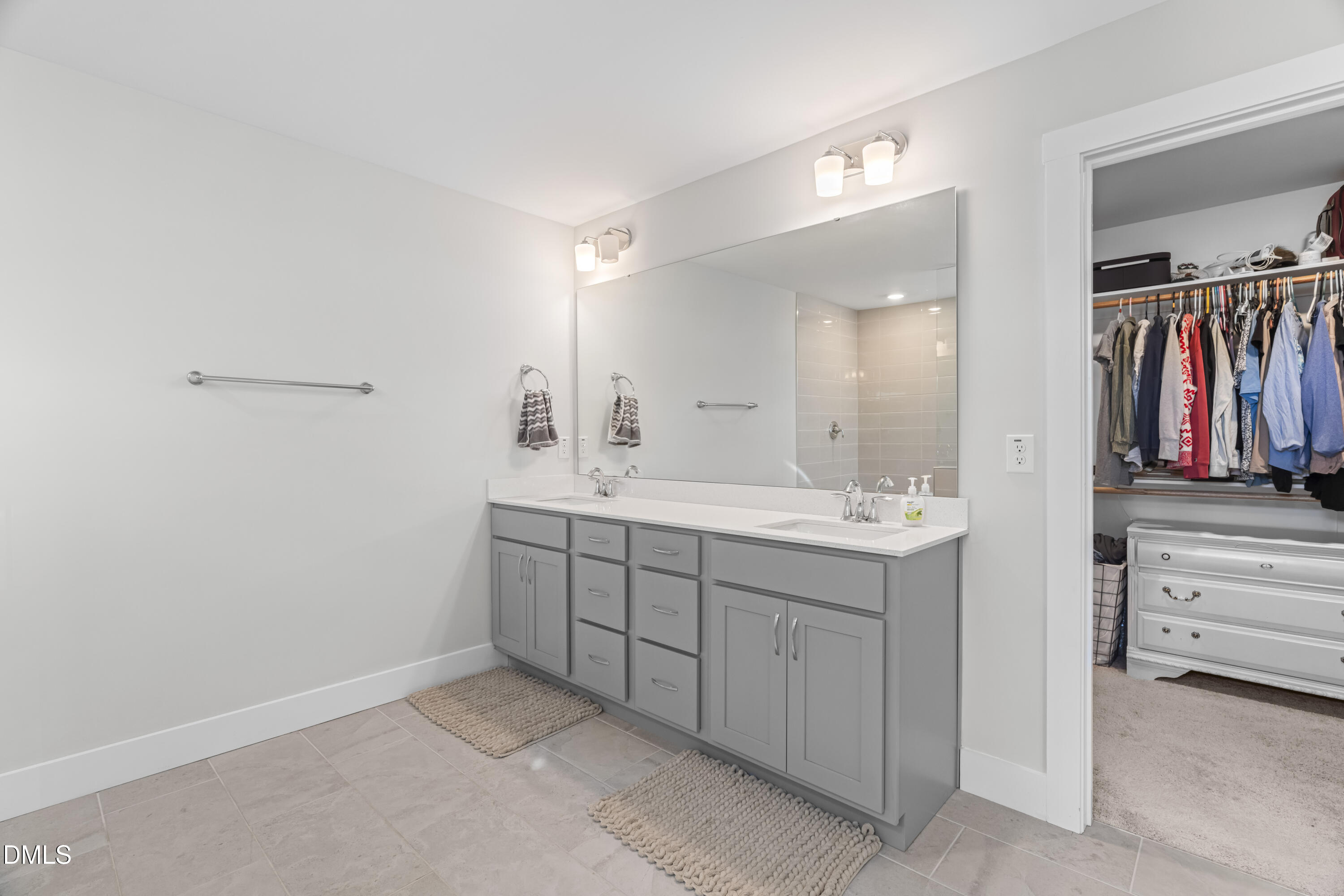 108 Bridge Street Smithfield, NC 27577 - Photo 22 of 48 a bathroom with a sink and a mirror