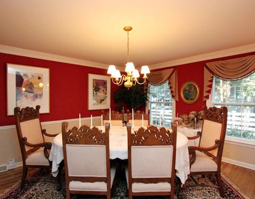 34 Lake Drive Riverside, CT 06878 - Photo 3 of 13 a view of a dining room with furniture and chandelier