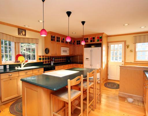 34 Lake Drive Riverside, CT 06878 - Photo 4 of 13 a kitchen with stainless steel appliances granite countertop a stove a sink and a wooden floors