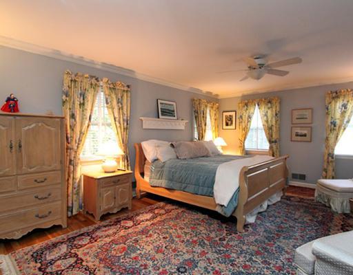 34 Lake Drive Riverside, CT 06878 - Photo 7 of 13 a bedroom with a bed and a window