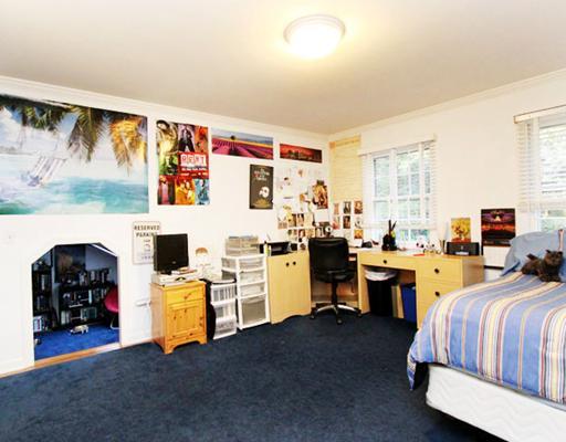 34 Lake Drive Riverside, CT 06878 - Photo 8 of 13 a bedroom with bed and a couch