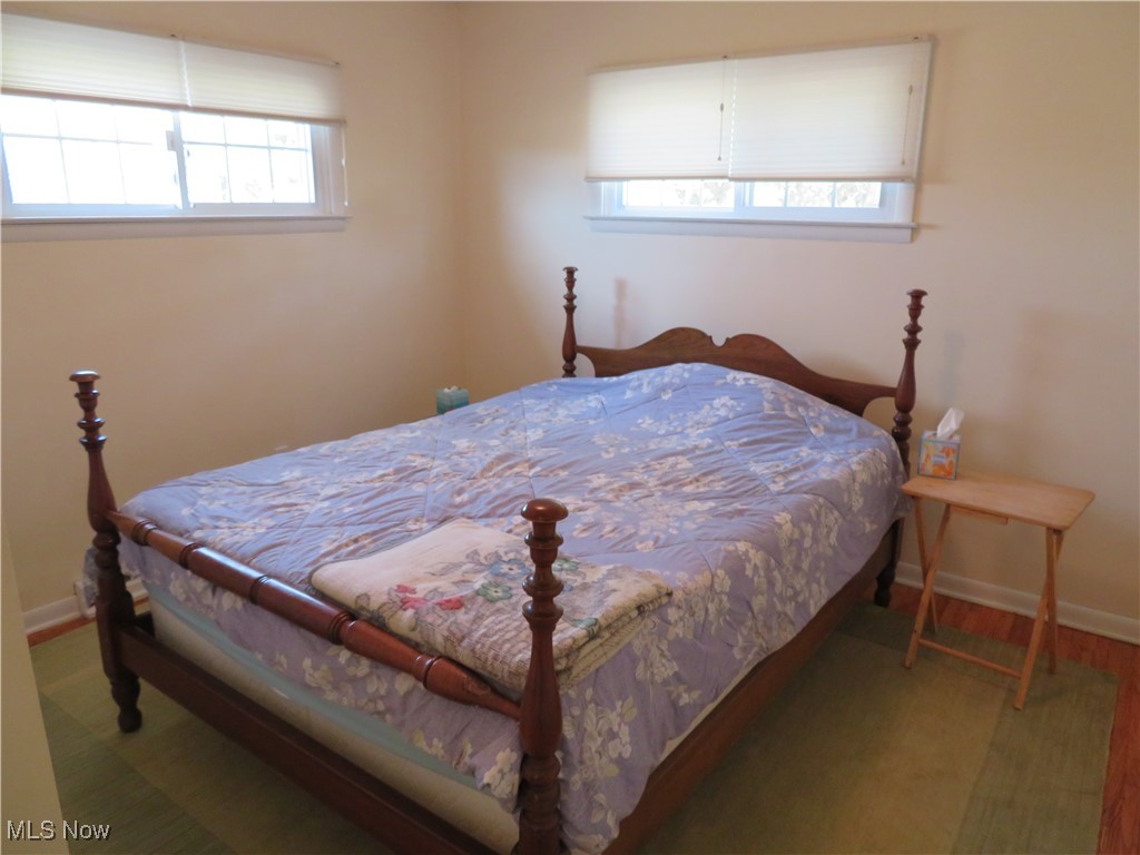 4358 Buss Road Wooster, OH 44691 - Photo 21 of 24 Bedroom with baseboards and wood finished floors