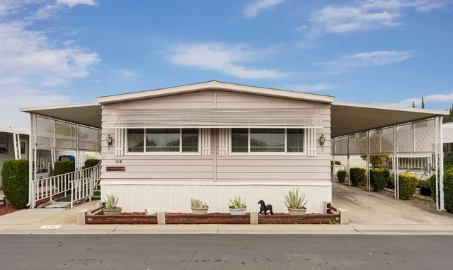 a front view of a house with a garage