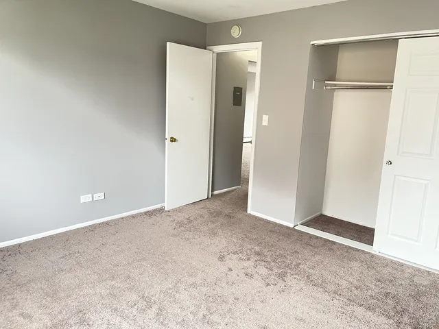 an empty room with a bathroom