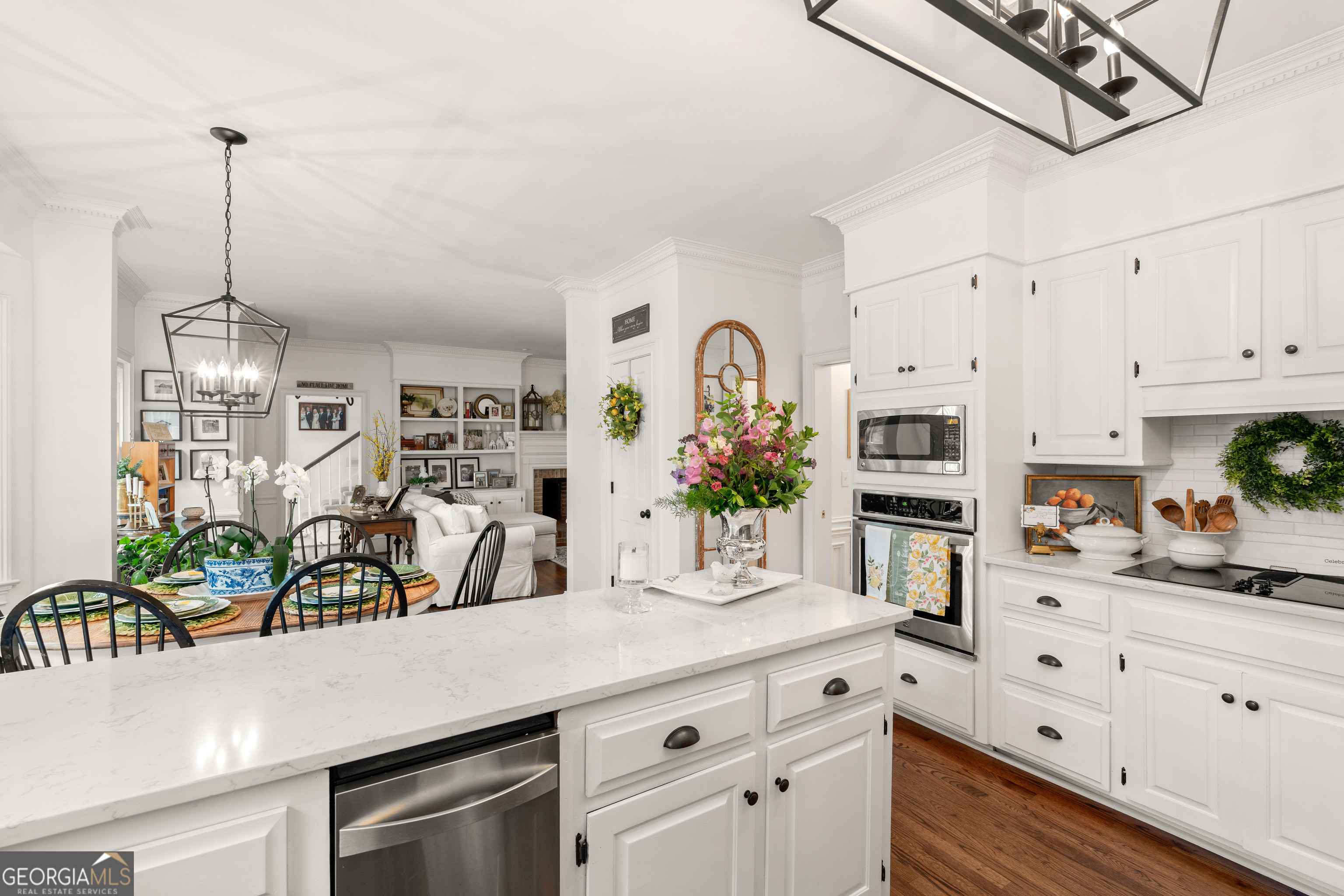 836 Oak Grove Road Carrollton, GA 30117 - Photo 22 of 50 a kitchen with stainless steel appliances kitchen island granite countertop a cabinets and potted plant