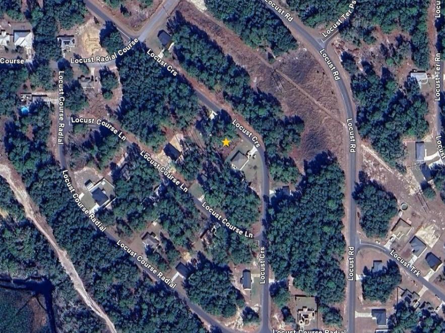 Locust Course Ocala, FL 34472 - Photo 3 of 5 a city view with tall trees