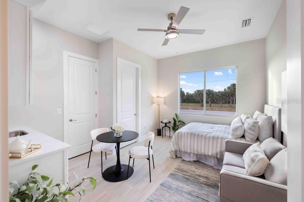 38 Lark Drive Placida, FL 33946 - Photo 26 of 46 a living room with furniture and a large window