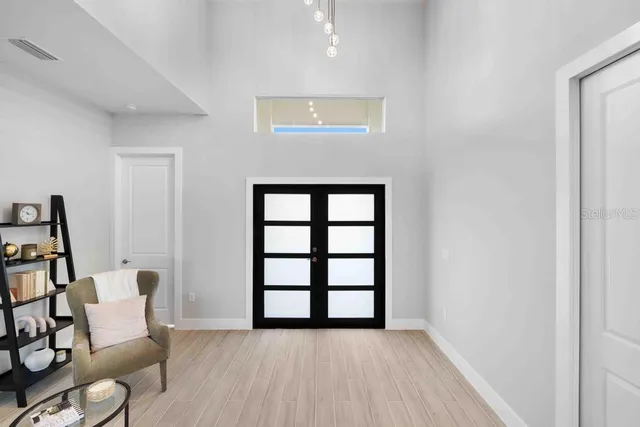 a view of livingroom with furniture and window