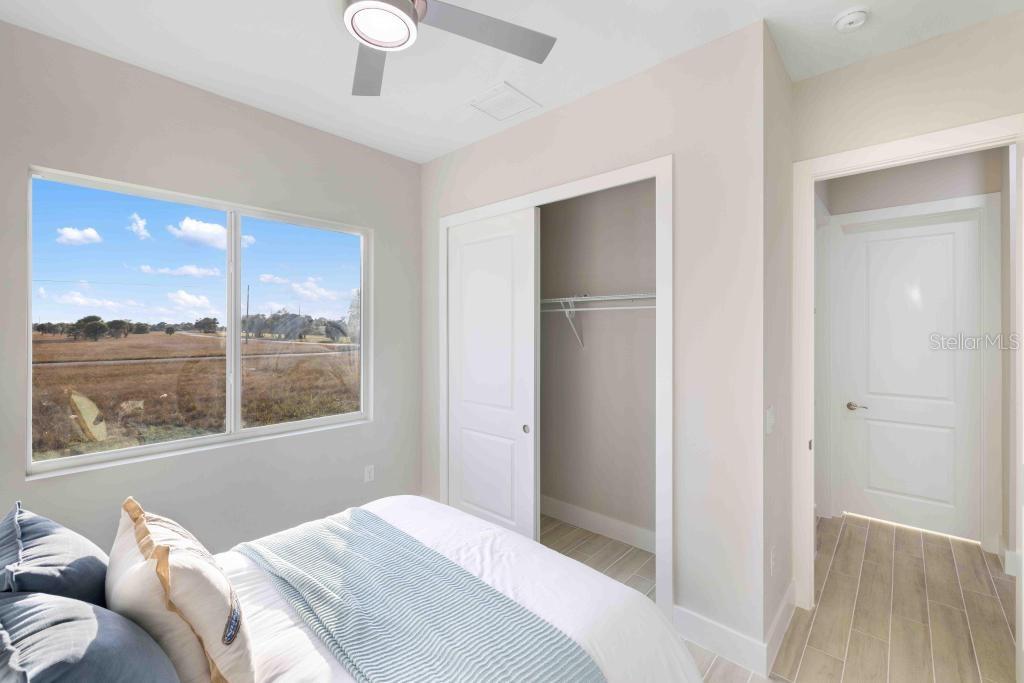 38 Lark Drive Placida, FL 33946 - Photo 32 of 46 a bedroom with a bed and a window